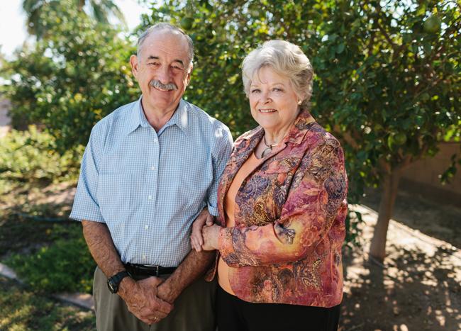 Kelly and Cheryl in front of the orange trees